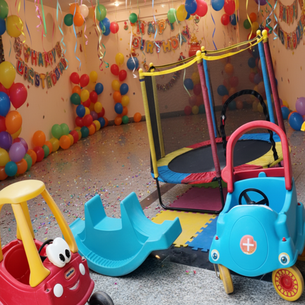 Children's play area with colorful toy cars and playground equipment.